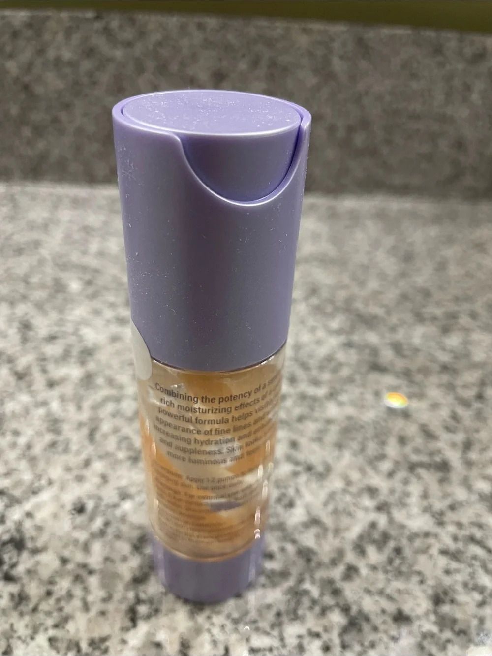 Meaningful Beauty Serum with Lavender Cap and Gold Swirls